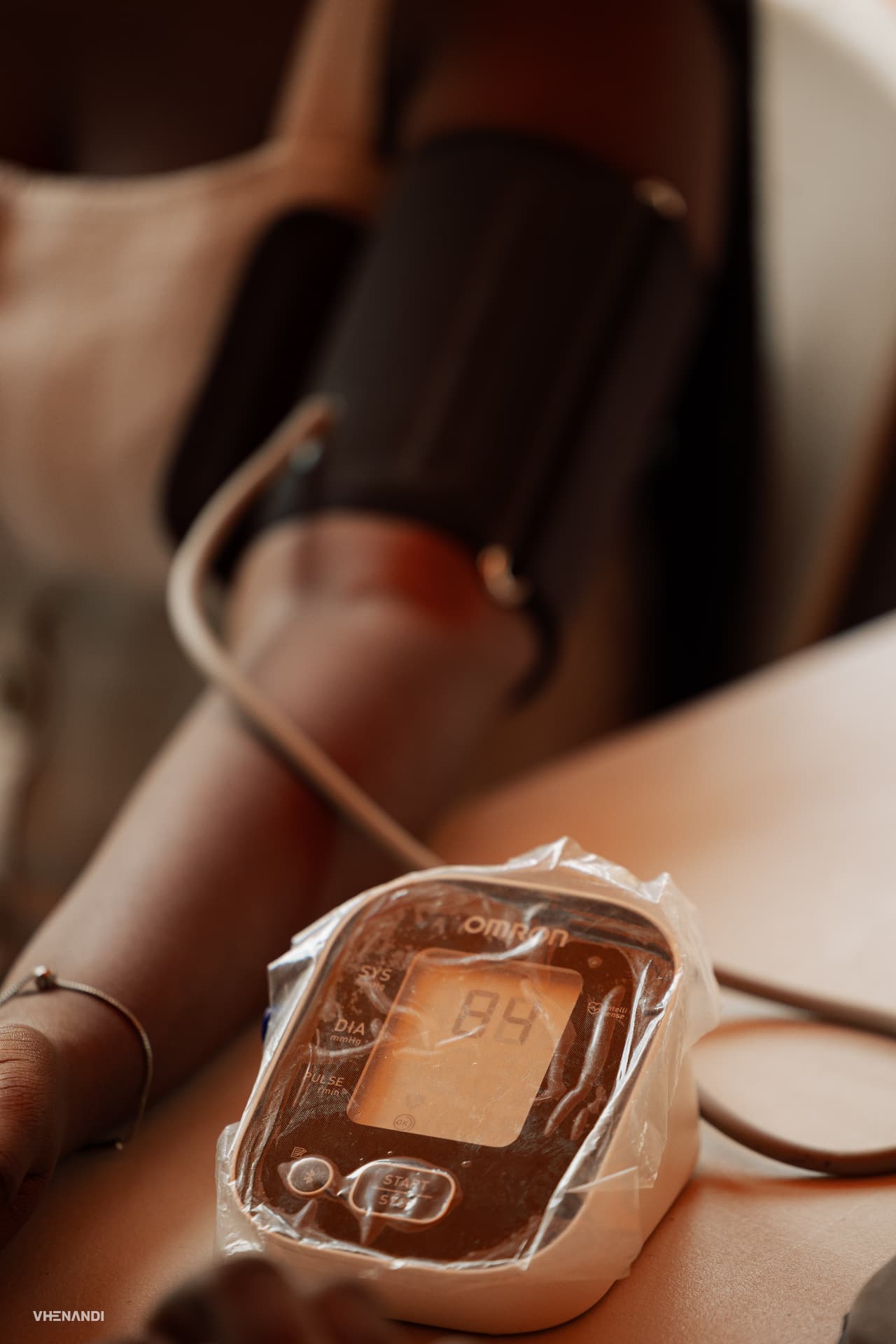 A donor's blood pressure reading being taken during screening